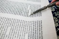 Torah scroll with pointer